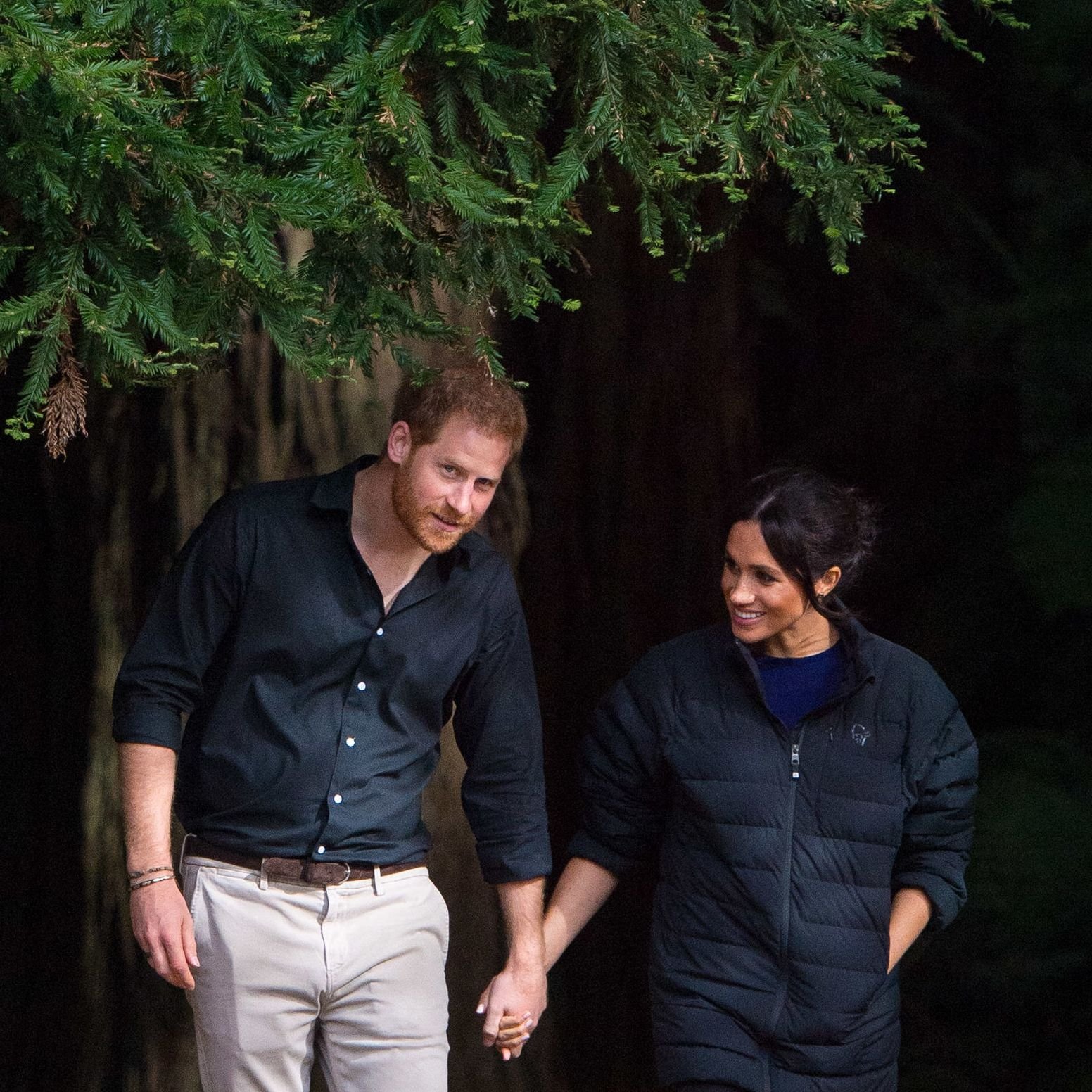 gettyimages-1055638204 Meghan Markle Wears Prince Harry's Puffer Coat in New Zealand | Teen Vogue